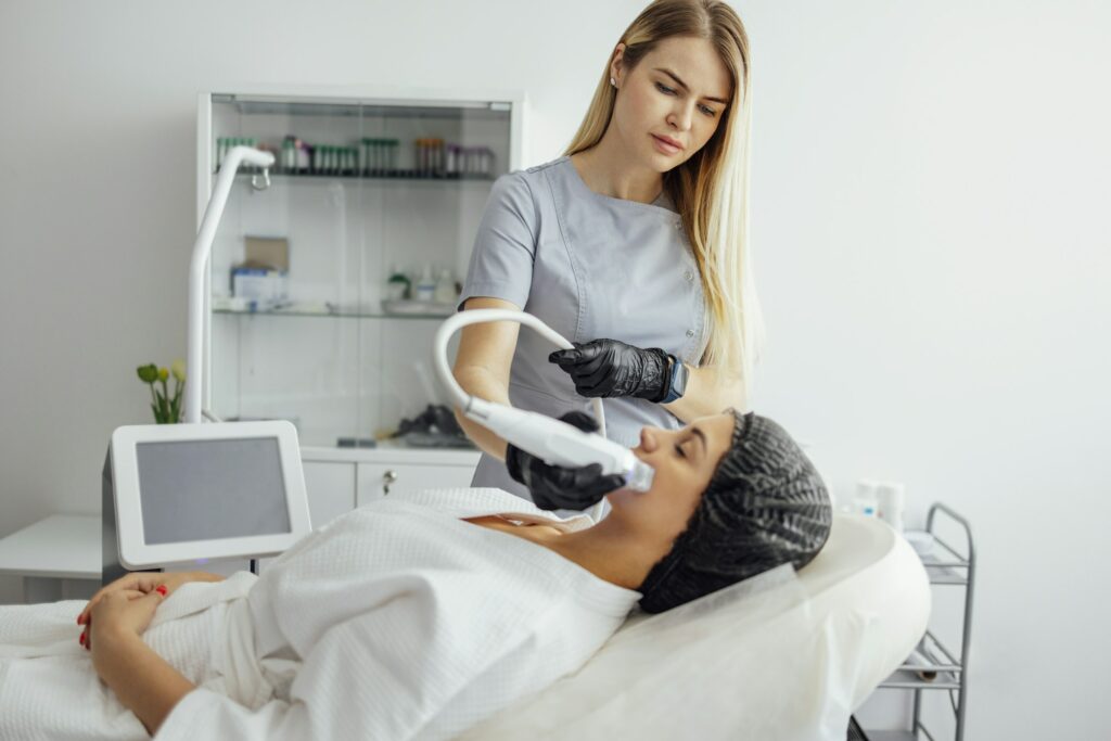 Microneedling device being used during a skin rejuvenation treatment at Hideaway Wellness & Aesthetics