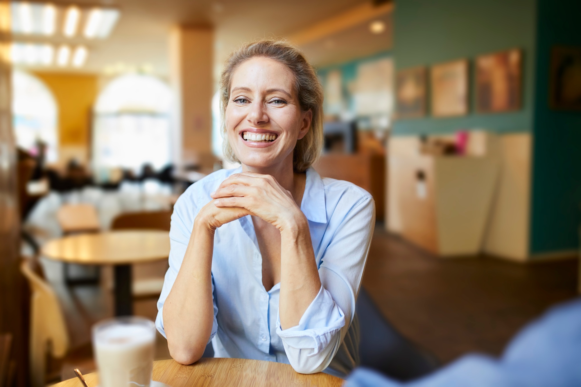 Happy, energized woman enjoying her day after Biote hormone therapy for women